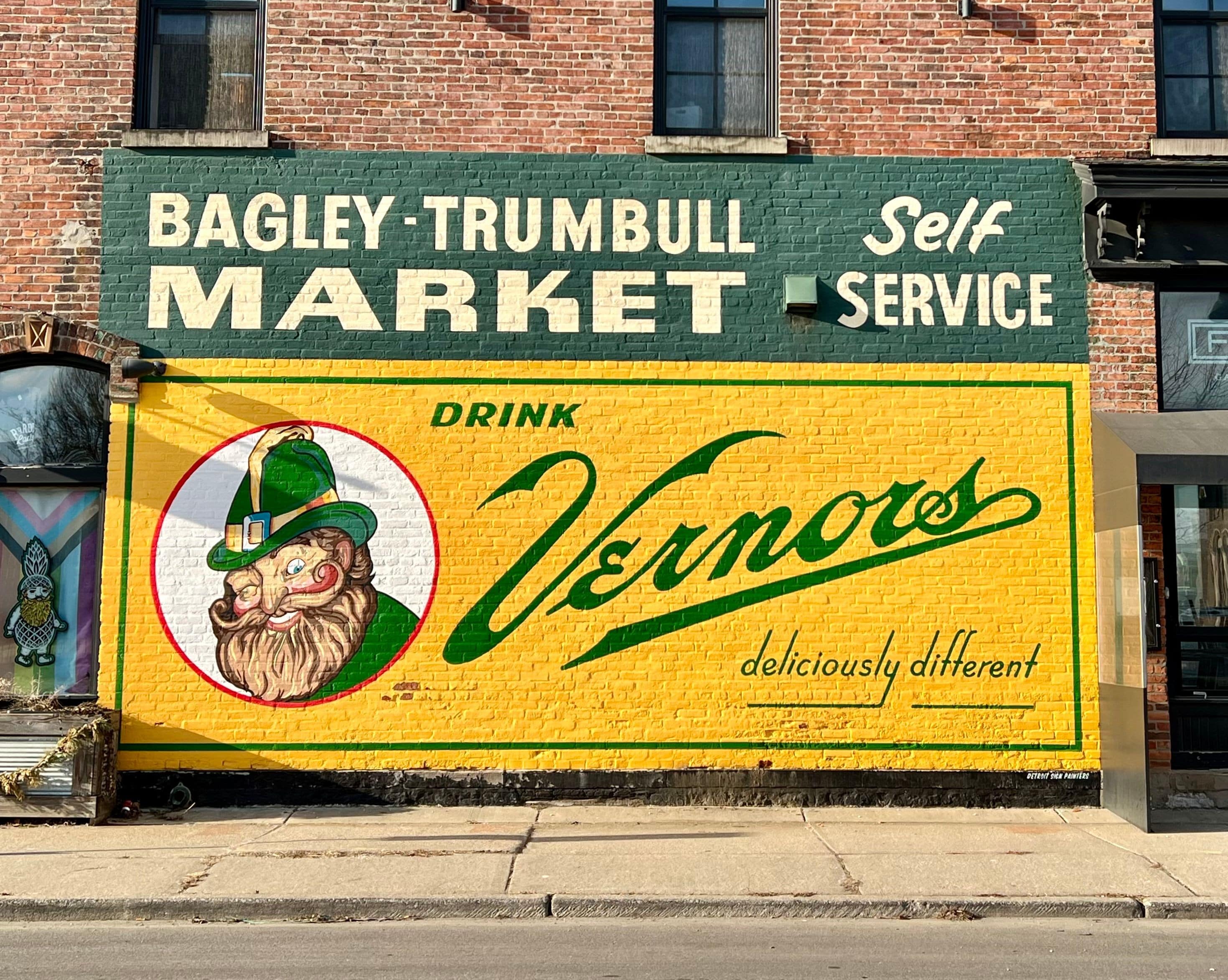 Sign depicts a nostalgic vintage billboard advertising Vernors Ginger Ale -- a longtime favorite Detroit soft drink.