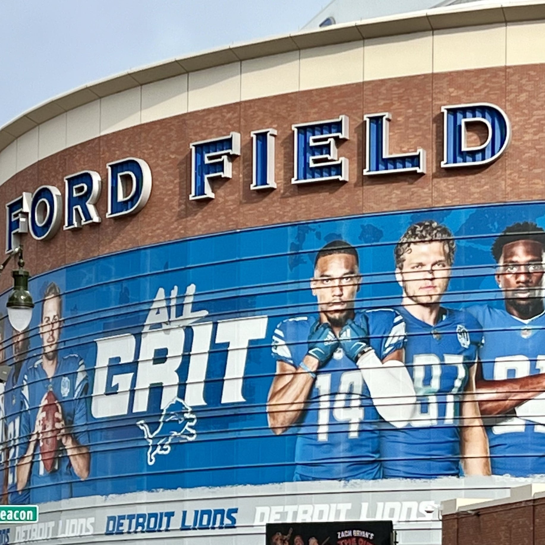 Giant sign on Ford Field celebrates the 2024 Detroit Lions.